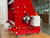 Side view of the InnoSlitter RC90 DTF roll slitter showing the air regulator, pressure gauge, solenoid valve, and InnoPrinter RC branding