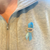 National Foster Care Month pin on sweatshirt.