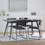 Belfield Dining Table Black lifestyle with chairs