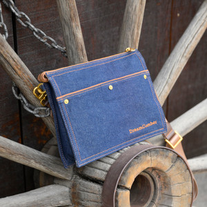 Lightweight denim bag with multi-purpose strap that can be worn as shoulder bag, sling bag, cross-body, waist bag, fanny pack.