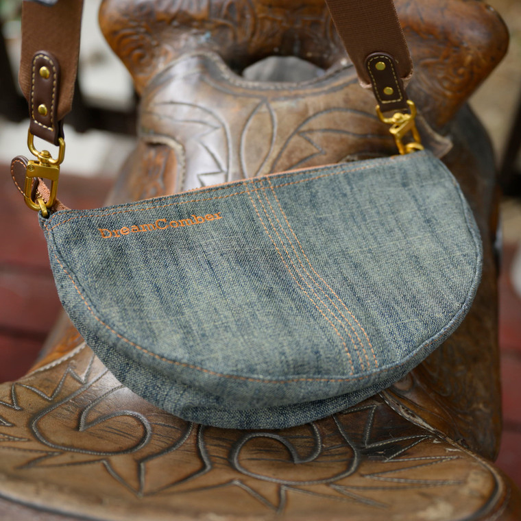 Lightweight denim Saddle bag with multi-purpose strap that can be worn as shoulder bag, sling bag, cross-body, waist bag, fanny pack.