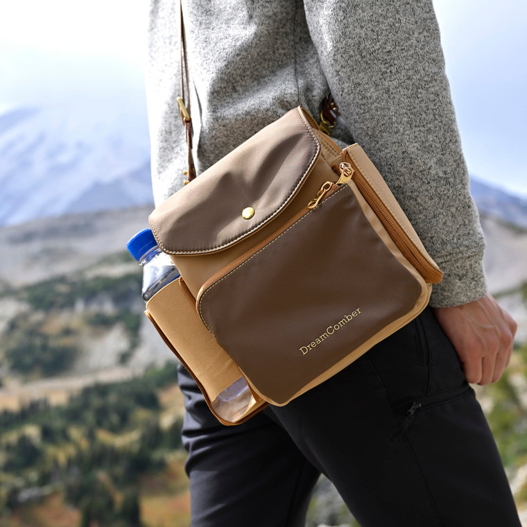 Lightweight, water resistant multi-purpose bag which can be used as a shoulder bag, cross-body, sling bag, waist bag or fanny pack.