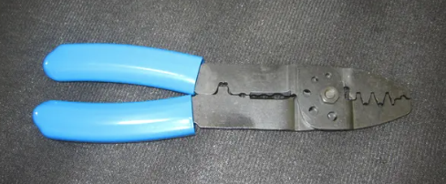 7002821: JLG CRIMPER, WIRE END