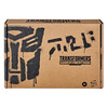 Transformers Generations Selects Deluxe Class WFC-GS12 GREASEPIT Action Figure in packaging.