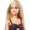 ​Barbie doll stands around 30 cm (12 inch) tall.