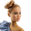 Barbie doll's hair is styled in a chic updo.