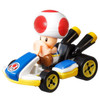 Iconic Mario Kart character Toad is molded into his blue & yellow Standard Kart​,