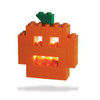 Don't carve a pumpkin, build one! Scare up some spooky Halloween fun anywhere with this exclusive mini building set.