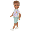 This 5.25-inch (13.5 cm) boy doll wears removable light-blue shorts and a white t-shirt with a super-cute print themed to gummy bear sweets.