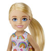 Chelsea™ doll's blonde hair is styled in a sweet ponytail, and yellow high-top trainers complete her look.