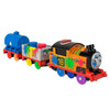 Motorized toy train featuring talking Nia™ engine with real character phrases and sounds ready for paint-splattered fun.