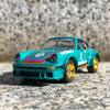 Approximately 1:57 scale, the Porsche 934 RSR measures around 7.5 cm (3 inches) in length.