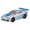 This Toyota Supra features a silver and blue deco inspired by Brian O'Connor's Nissan Skyline GT-R in 2 Fast 2 Furious.
