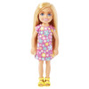 This 5.25-inch (13.5 cm) Chelsea doll is super-cute in a purple dress with colourful flowered print.