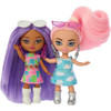 Two out of the five dolls are exclusive to this pack - The first doll rocks a pink ponytail with a printed dress and boots, while the second doll pairs her purple hair with a fun dress and go-go boots.