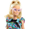 Barbie doll's blonde hair is styled in a fashion-forward updo.