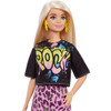 Barbie doll is the original body type and wears a black t-shirt with colourful "rock" graphic and neon pink animal-print skirt Barbie doll is the original body type and wears a black t-shirt with colourful "rock" graphic and neon pink animal-print skirt