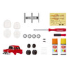 23-Piece Model Kit: Everything you need to customise your red 1956 Chevy Nomad including chassis, wheels, axles, stickers, screwdriver, and more!