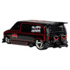 This modified 1985 Chevy Astro Van features colours and graphics inspired by Batman: The Caped Crusader