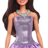 She is headed to a glitzy and glam event in her purple bubble dress! The strapless bodice shines with a sequined print, while her satiny skirt adds plenty of fun flounce
