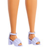 Sweet lavender block heels brighten her look even more