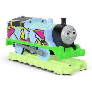 Thomas & Friends Hyper Glow Thomas motorized toy train features lights that leave a glowing trail on glow-in-the-dark TrackMaster track.
