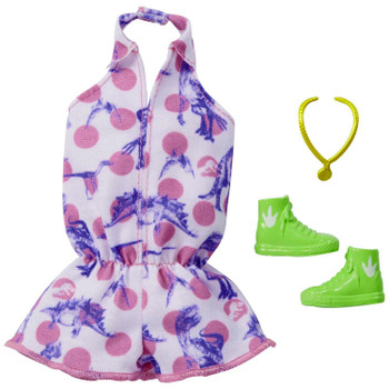 Dress a doll in this cute shorts romper featuring a pink polka dot and dinosaur print pattern. Lime green boots with a dinosaur graphic and a necklace add a pop of colour and complete the look.