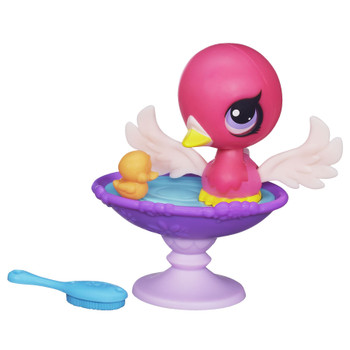 The bath and brush in the Splashin' Swan Bath set bring your swan pet to life. When you brush her, she bats her big eyes because she's so happy! She loves to take a bath, and when you put her in it and play with her rubber ducky, she flaps her wings.