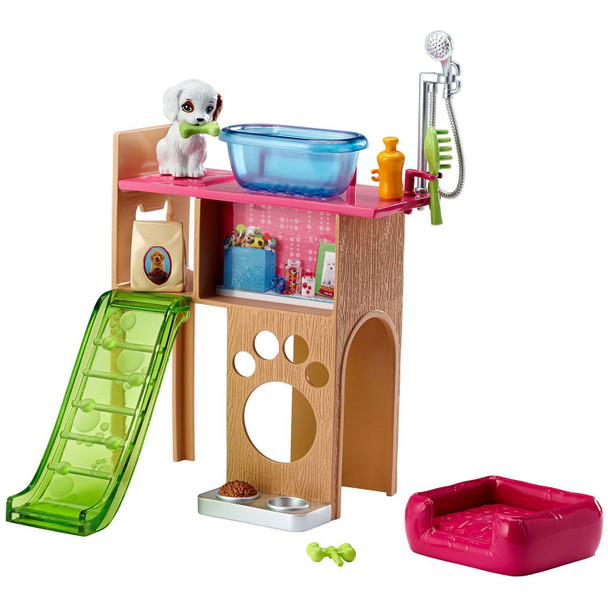 The pet station features grooming space on top and pet play below, with a pink top, paw cut-out in the "wooden" body and green puppy slide.