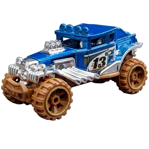 Authentically styled Baja Bone Shaker with gold-rimmed off-road wheels, a dirt-splattered racing deco, and chrome details.