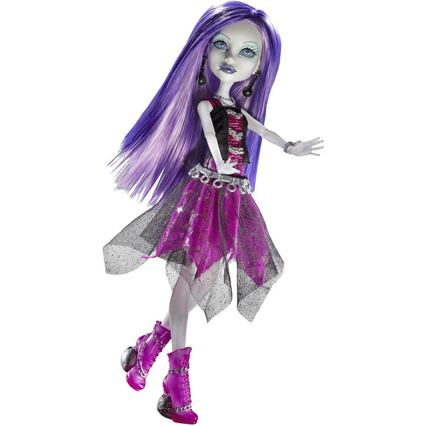 The daughter of the Ghosts, Spectra Vondergeist doll glows an eerie blue and makes a spooky "woo"-ing sound when she glows — perfect for haunting the Monster High howlways for gossip.