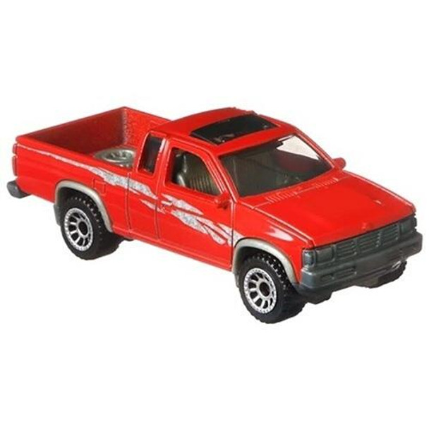 1995 Nissan Hardbody in red.