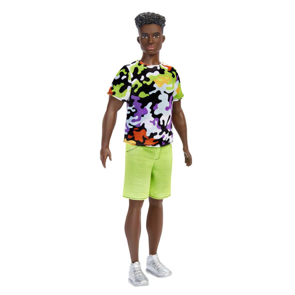 Ken doll is broader than the original and wears a multi-coloured camo print shirt paired with neon green shorts


