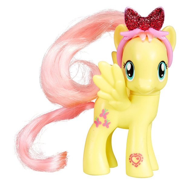 This My Little Pony Explore Equestria Fluttershy figure comes with a beautiful, removable headband with a glittery bow to wear in her hair.
