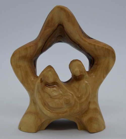 Holy family star wood carving.