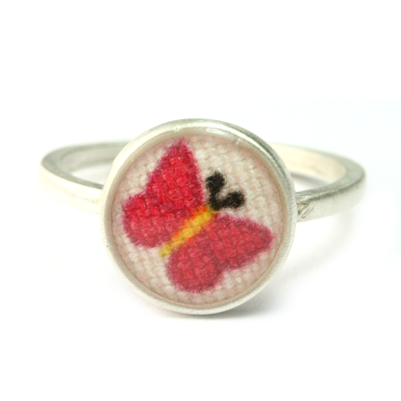 Tiny pink butterfly ring
