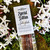 Sacred Mists Fairytale handcrafted incense sticks surrounded by lush green moss and fresh white jasmine flowers.