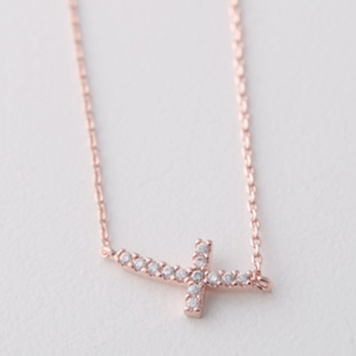 swarovski curved silver tiny sidesays cross necklace rose gold kellinsilver ad 39718.1387749551