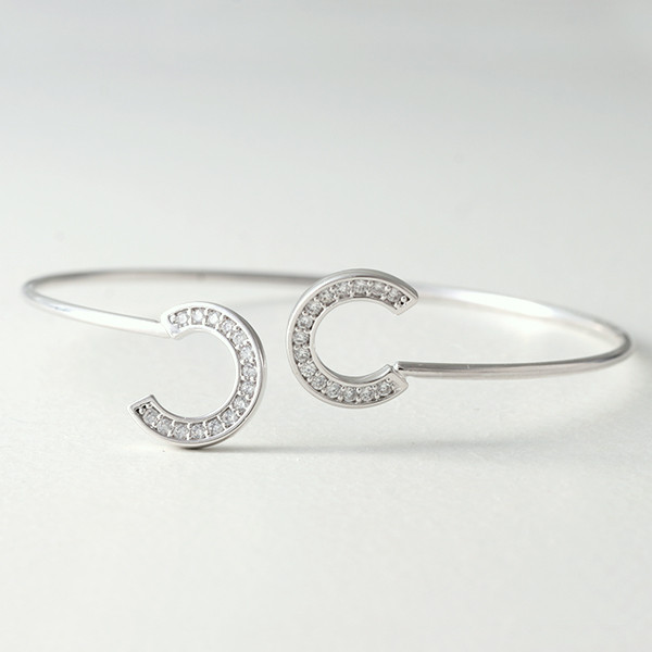 Swarovski White Gold Horseshoe Knot Bangle Bracelet
