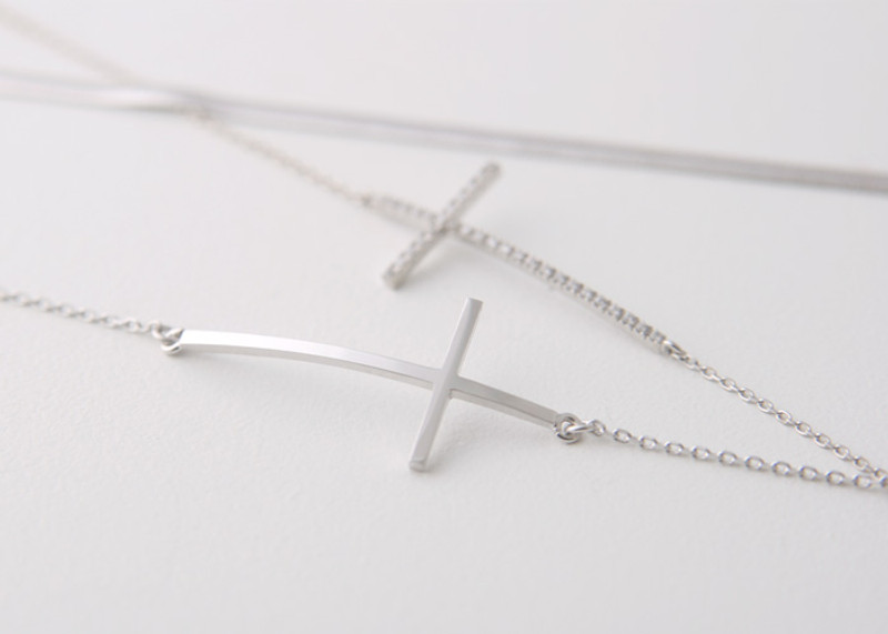 Sterling Silver Sideways Cross Bracelet White Gold from kellinsilver.com