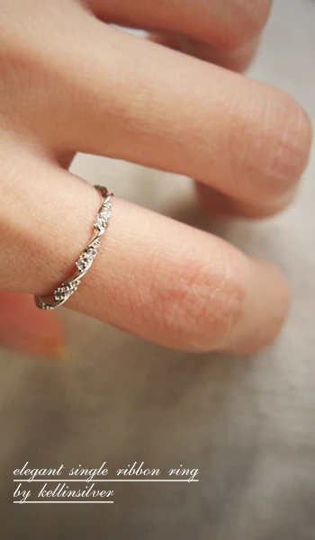 CZ Elegant Single Ribbon Ring White Gold from kellinsilver.com