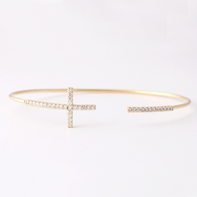 Swarovski Sideways Cross Cuff Bracelet Gold from kellinsilver.com