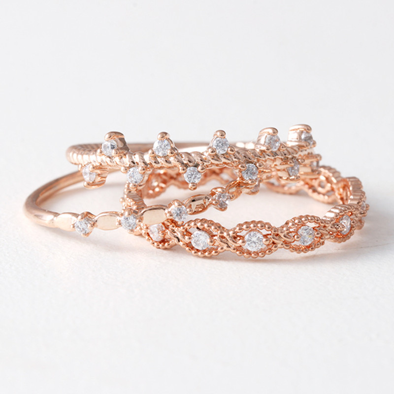 CZ Twinkle Bridge Ring Rose Gold from kellinsilver.com