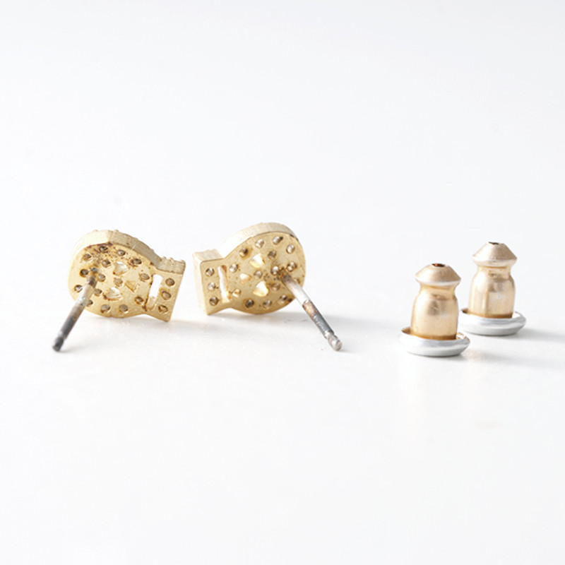 Swarovski Gold Small Skull Stud Earrings from kellinsilver.com