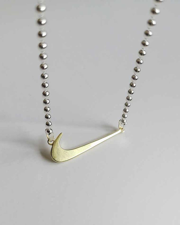 Gold Nike Swoosh Necklace