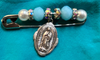 Vintage Safety Pin Brooch with white and blue beads, and an Our Lady of Guadelupe medal , Only one available, 2 1/4 inches long