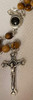 Olive wood round bead rosary with soil from the Holy Land center piece (made by Christians in the Holy Land) Olive wood round bead rosary with soil from the Holy Land center piece (made by Christians in the Holy Land)
