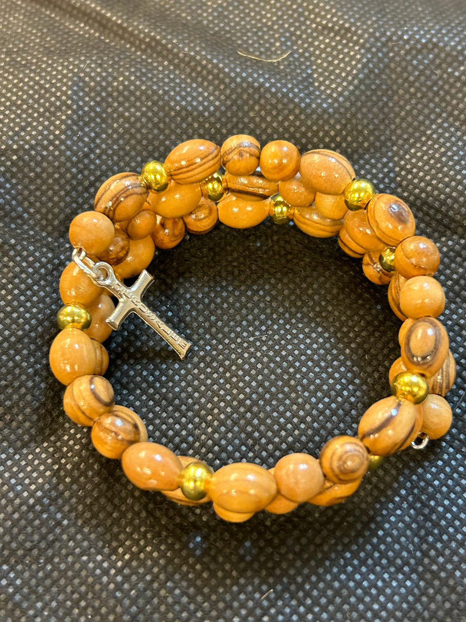 Olive wood, ovel beads and golden beads rosary (made by Christians in the Holy Land)