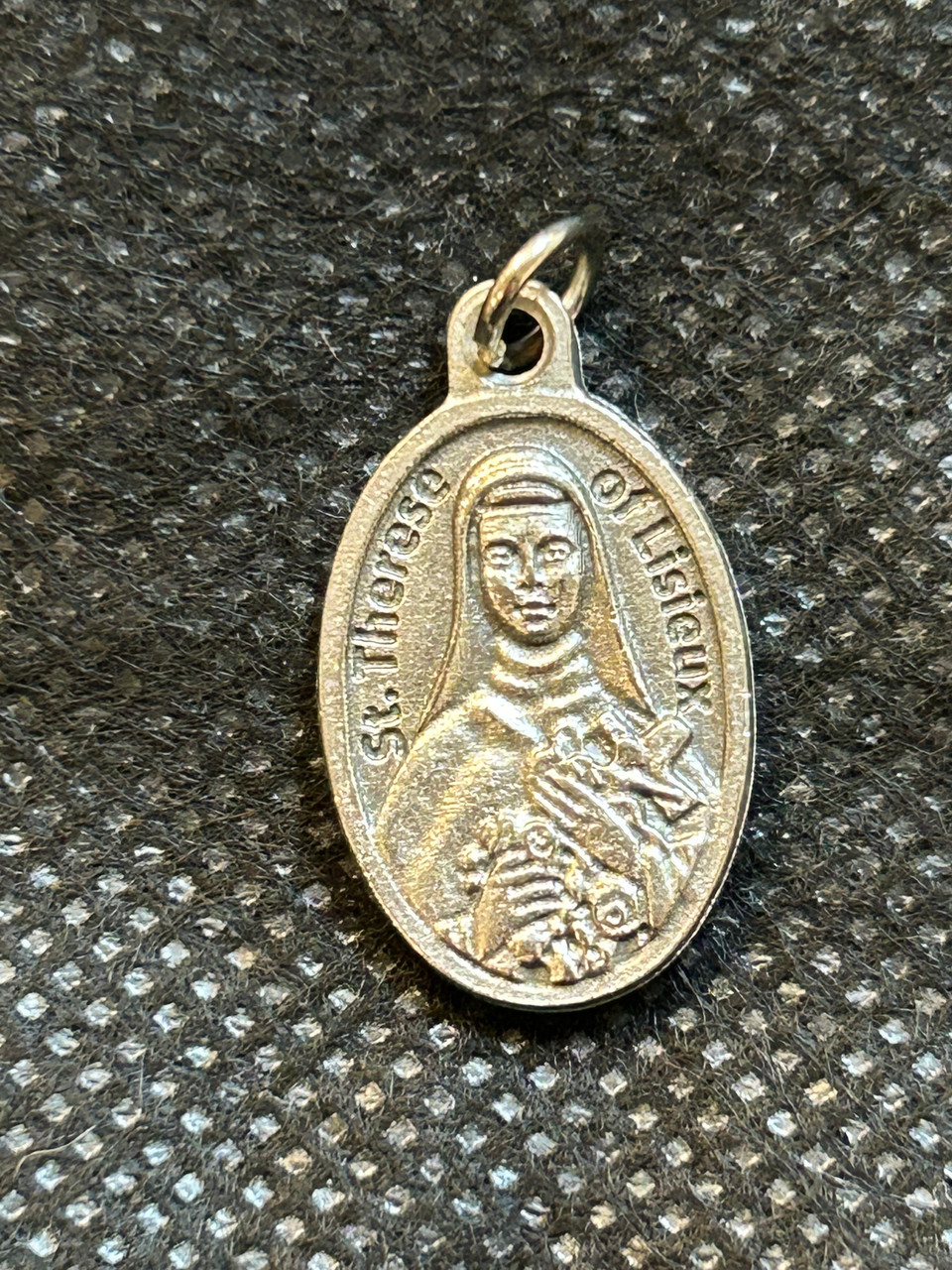 Saint Therese of Lisieux third class relic medal