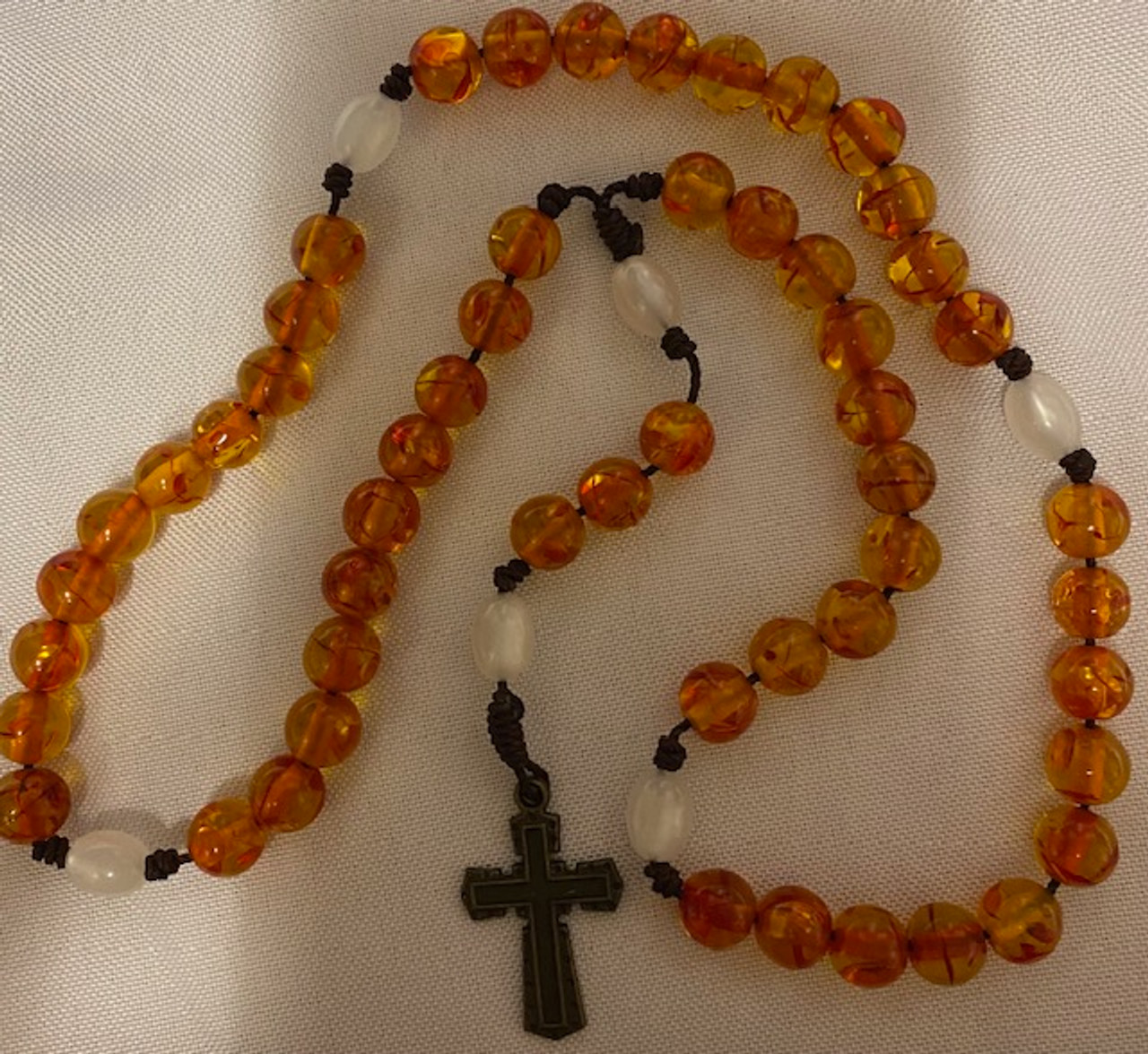 Orange beads White Beads on Black Corded Rosary